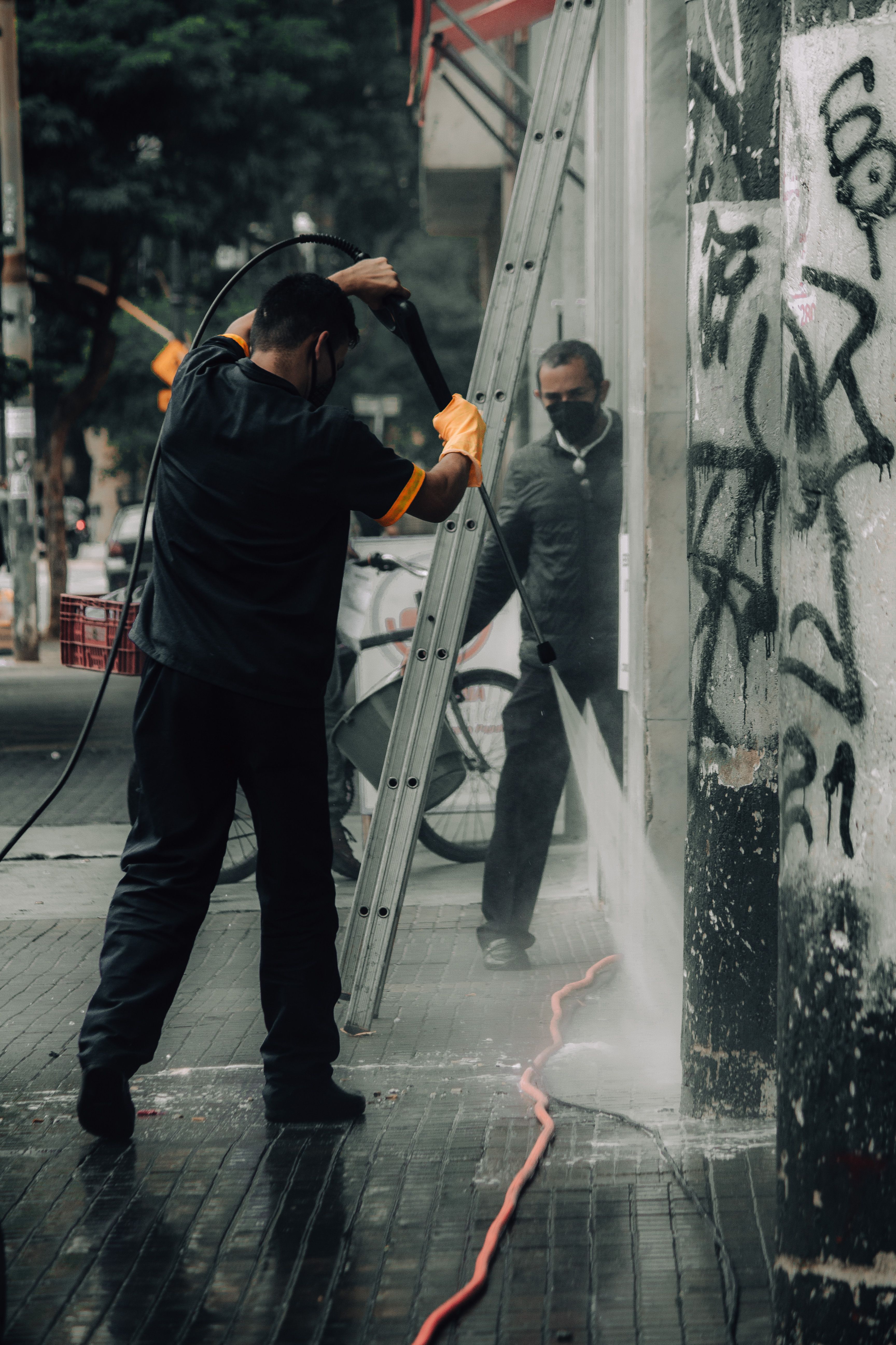Pressure washing paving and exterior surfaces